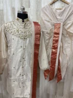 Pure tissue pattu dhoti set with heavy maggam work