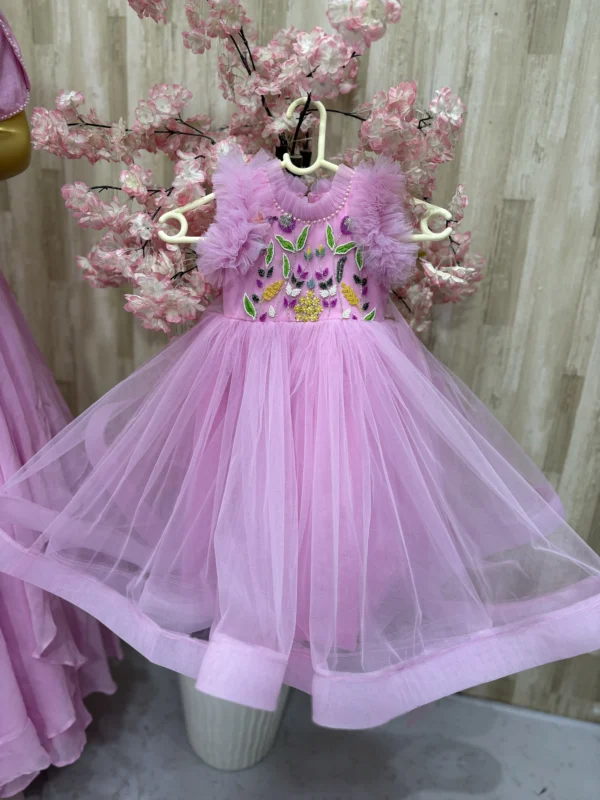 Beautiful designer net frock with heavy maggam work