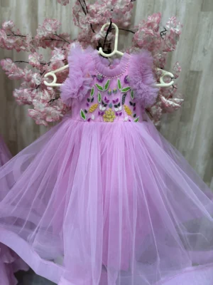 Beautiful designer net frock with heavy maggam work