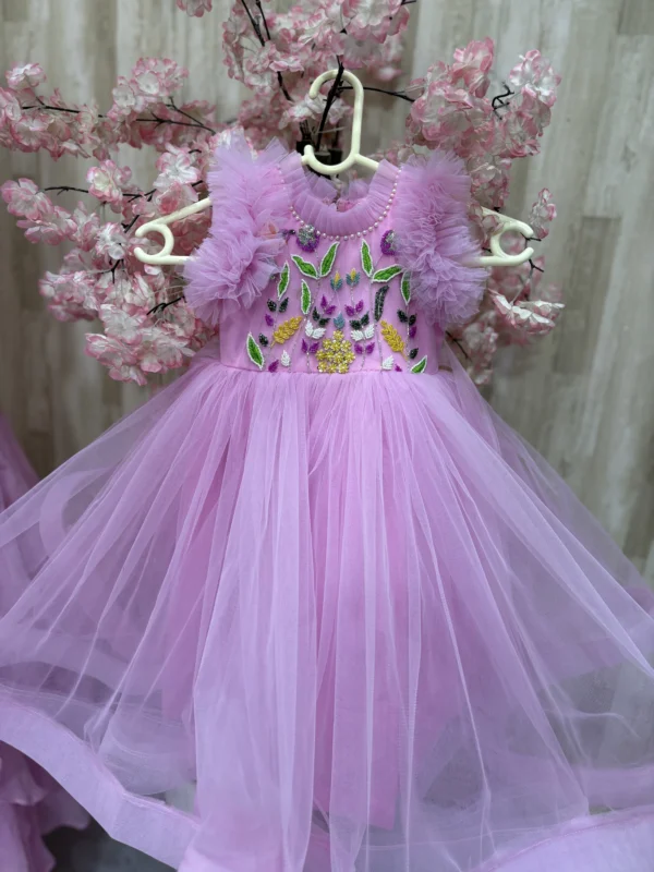 Beautiful designer net frock with heavy maggam work