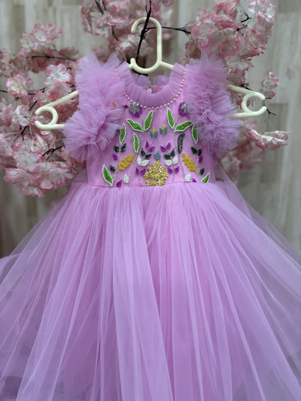 Beautiful designer net frock with heavy maggam work