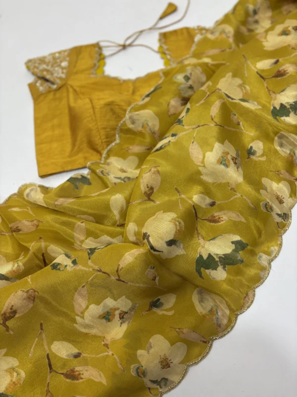 Tissue floral saree with maggam work blouse & scallop border