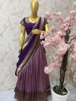 Soft silk lehenga having rich border paired with heavy maggam work blouse & muniya dupatta