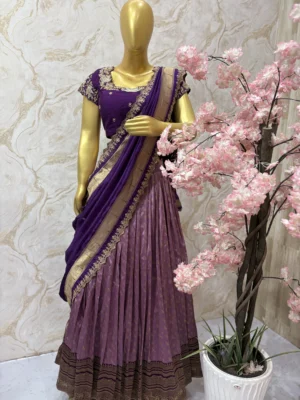 Soft silk lehenga having rich border paired with heavy maggam work blouse & muniya dupatta