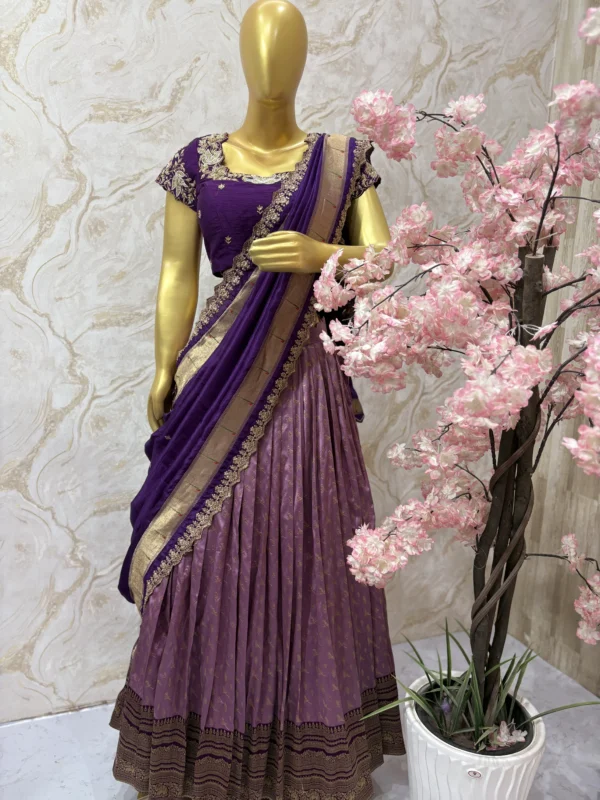 Soft silk lehenga having rich border paired with heavy maggam work blouse & muniya dupatta