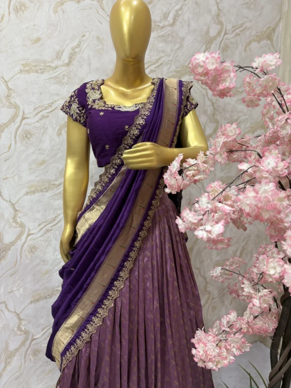 Soft silk lehenga having rich border paired with heavy maggam work blouse & muniya dupatta