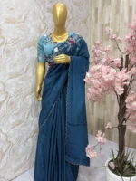 Pure crepe saree having pretty embroidery work on shoulder & all over scalap border paired with embroidery work blouse