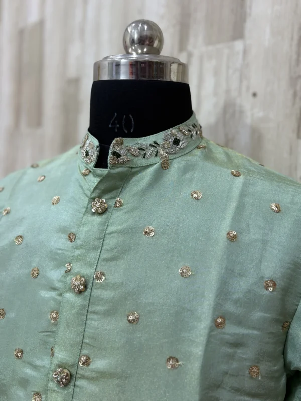 Tissue men's kurta having maggam work on collar paired with cream colour pijama