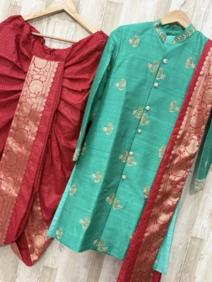 sherwani with pure rawsilk having beautiful maggam work paired up with contrast dhoti & kanduva