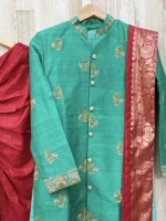 sherwani with pure rawsilk having beautiful maggam work paired up with contrast dhoti & kanduva