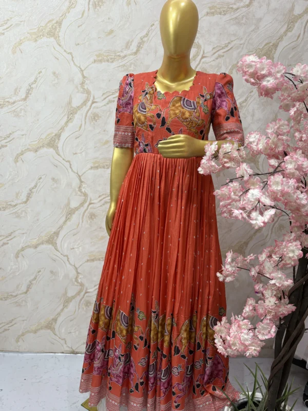 Beautiful kalamkari orange colour long gown with good flare