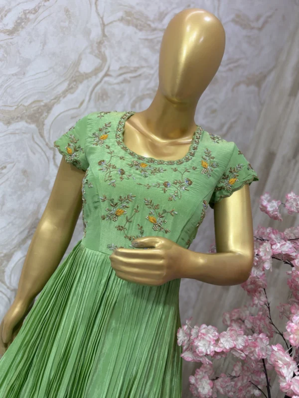 Tissue gown with maggam work yoke in pista green