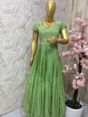 Tissue gown with maggam work yoke in pista green
