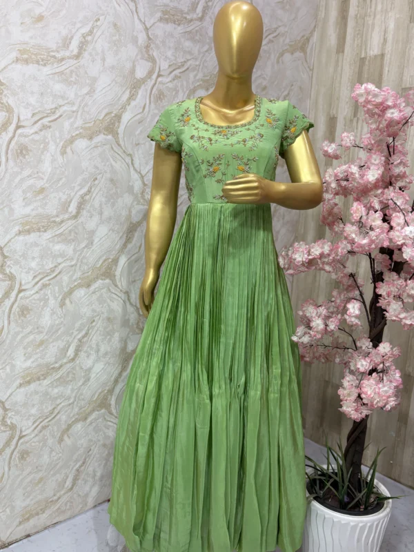 Tissue gown with maggam work yoke in pista green