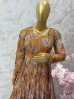 Floral long gown with beautiful maggam work on yoke part