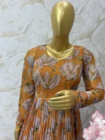 Floral long gown with beautiful maggam work on yoke part