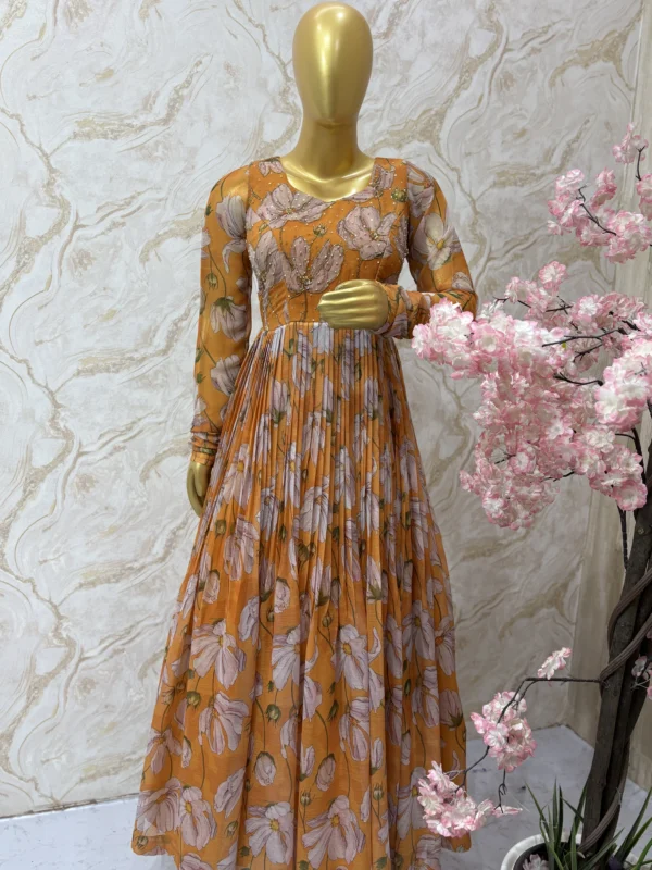 Floral long gown with beautiful maggam work on yoke part