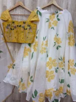 Floral organza lehenga paired with maggam work blouse & dupatta