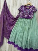 Tissue hand work lehenga paired with heavy maggam work blouse & dupatta