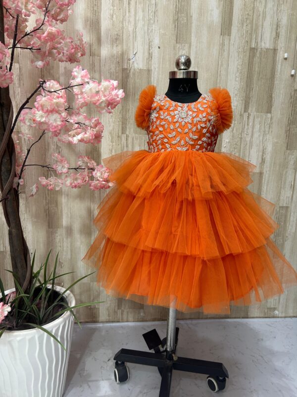 beautiful designer net frock with heavy maggam work