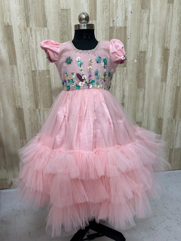 Beautiful designer net frock with heavy maggam work