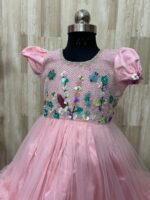 Beautiful designer net frock with heavy maggam work