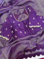 Purple saree having beautiful border paired with beautiful maggam work blouse