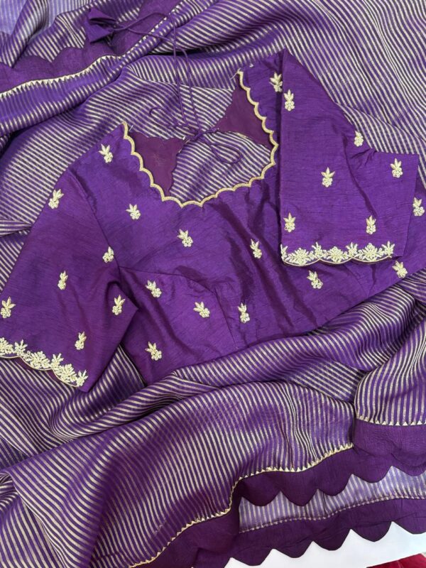 Purple saree having beautiful border paired with beautiful maggam work blouse