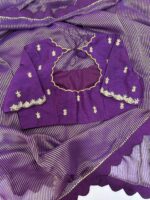 Purple saree having beautiful border paired with beautiful maggam work blouse
