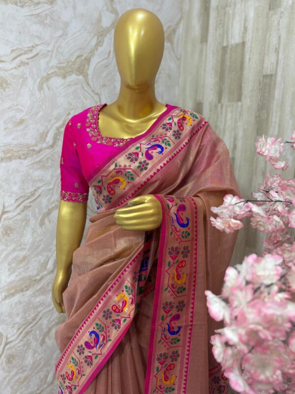 Soft tissue saree with pithani border paired with beautiful maggam work blouse