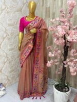 Soft tissue saree with pithani border paired with beautiful maggam work blouse