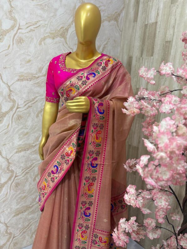 Soft tissue saree with pithani border paired with beautiful maggam work blouse