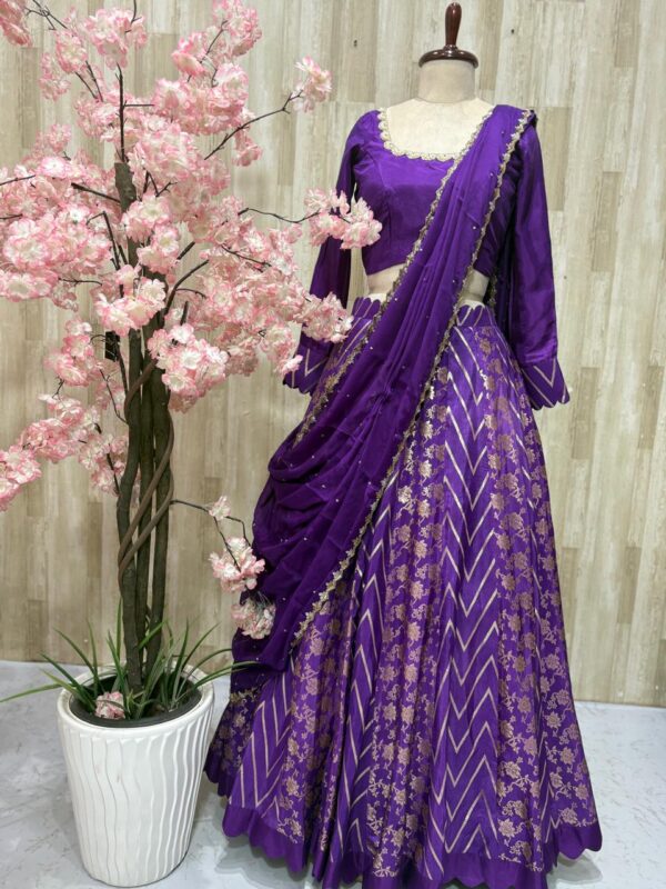 Pure banaras crepe silk lehenga blouse paired with hand work dupatta
