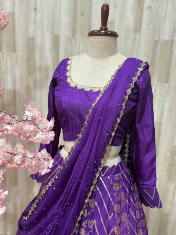 Pure banaras crepe silk lehenga blouse paired with hand work dupatta