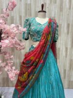 Tissue lehenga paired with heavy maggam work blouse & dupatta