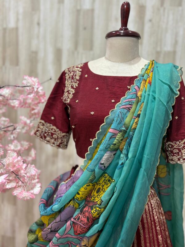 Beautiful lehenga paired with heavy maggam work blouse and kalamkari dupatta