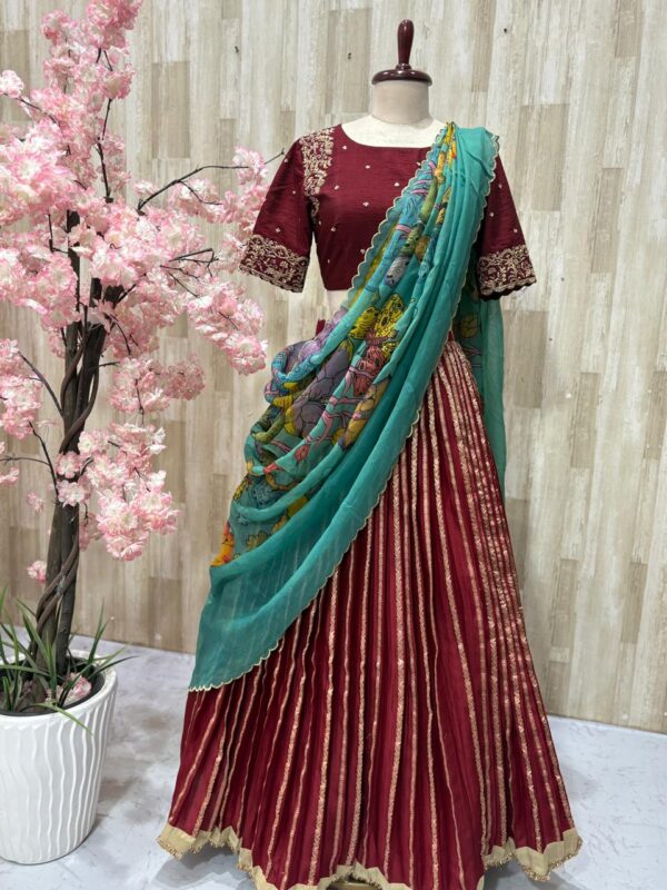 Beautiful lehenga paired with heavy maggam work blouse and kalamkari dupatta