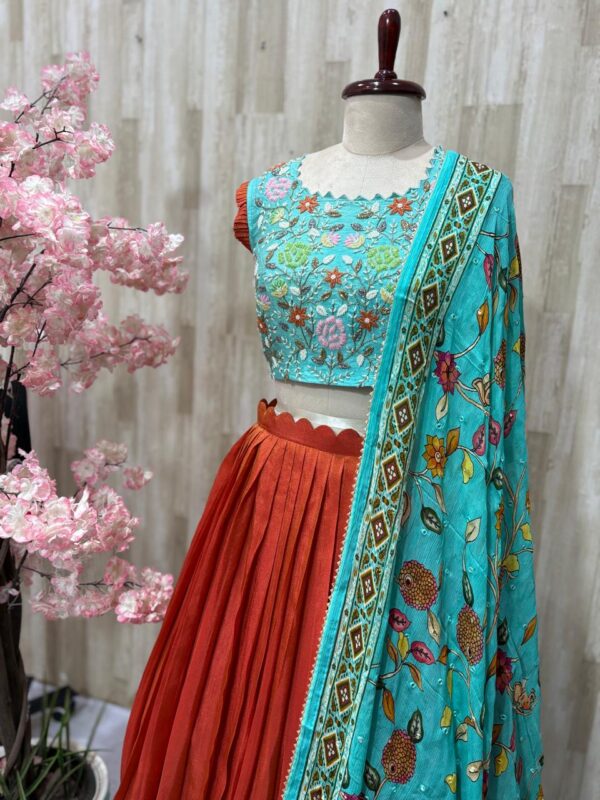 Tissue legenga paired with heavy maggam work blouse and kalamkari dupatta