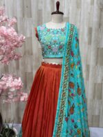 Tissue legenga paired with heavy maggam work blouse and kalamkari dupatta