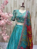 Tissue lehenga paired with heavy maggam work blouse & dupatta