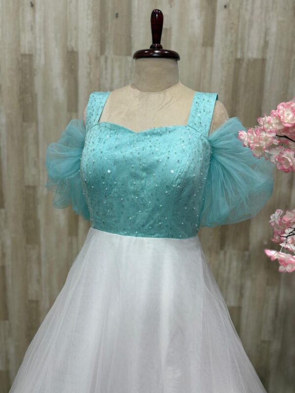 Soft net long gown with beautiful sequin work on yoke part