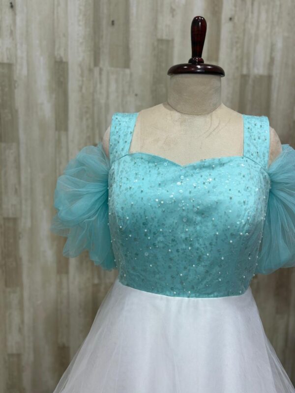 Soft net long gown with beautiful sequin work on yoke part
