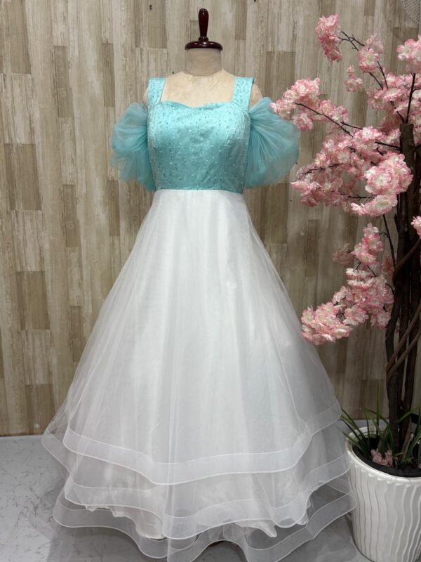 Soft net long gown with beautiful sequin work on yoke part
