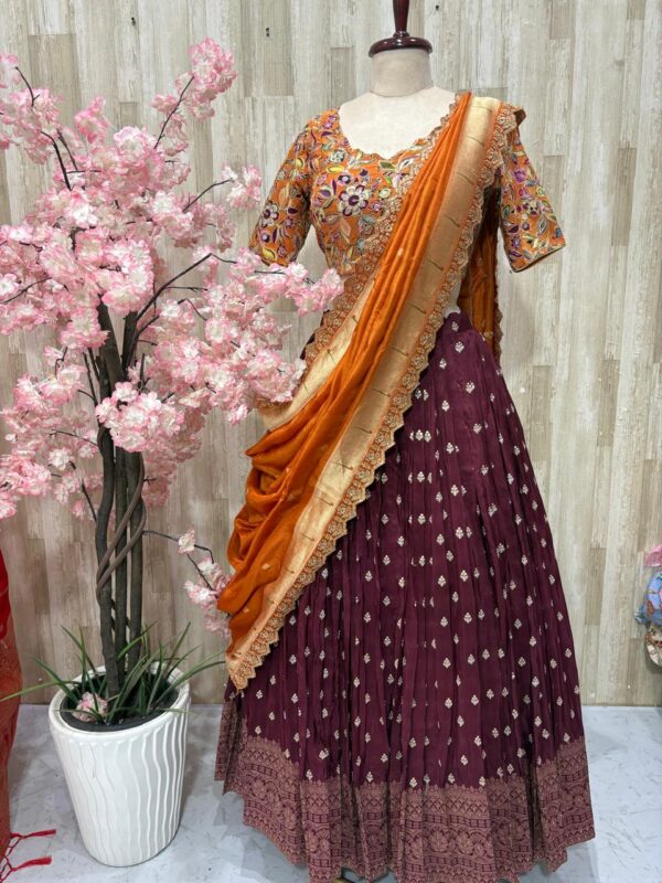 Hand work lehenga with rich border paired with beautiful sequin work floral blouse & pithani dupatta