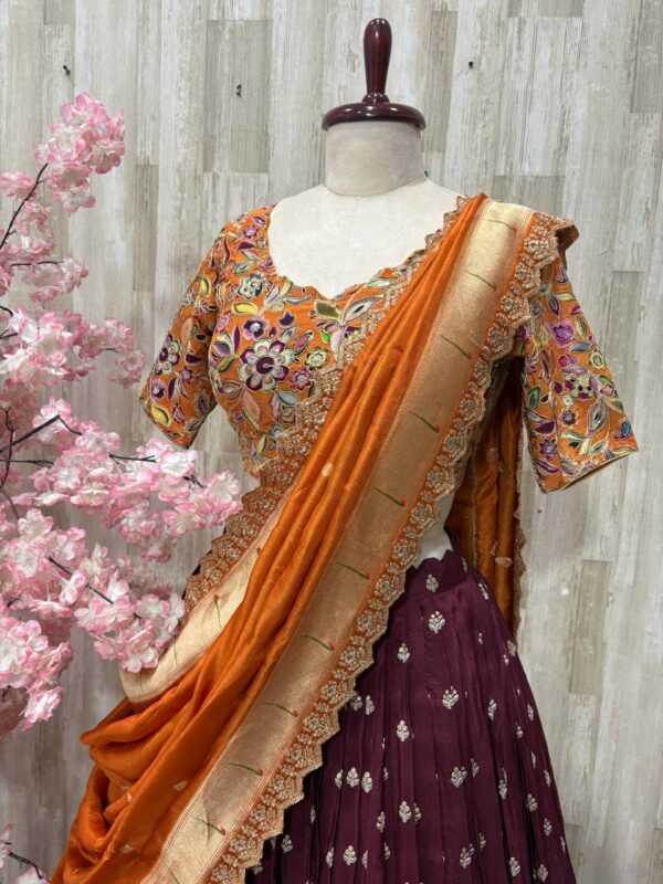 Hand work lehenga with rich border paired with beautiful sequin work floral blouse & pithani dupatta