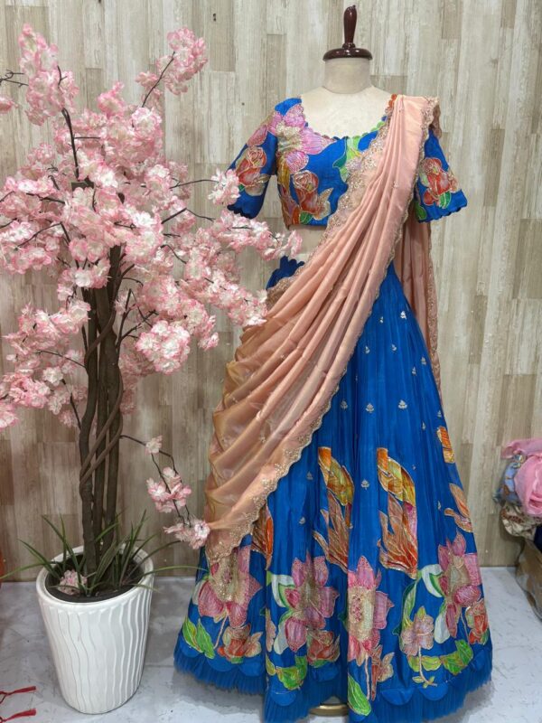 Chiffon lehenga paired with blouse & beautiful hand work dupatta