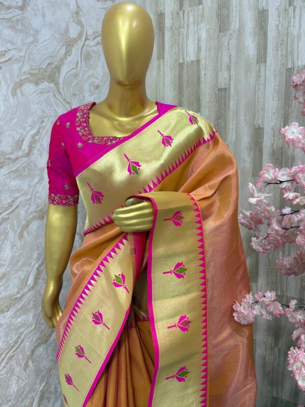 Banaras paithani saree paired with beautiful maggam work blouse