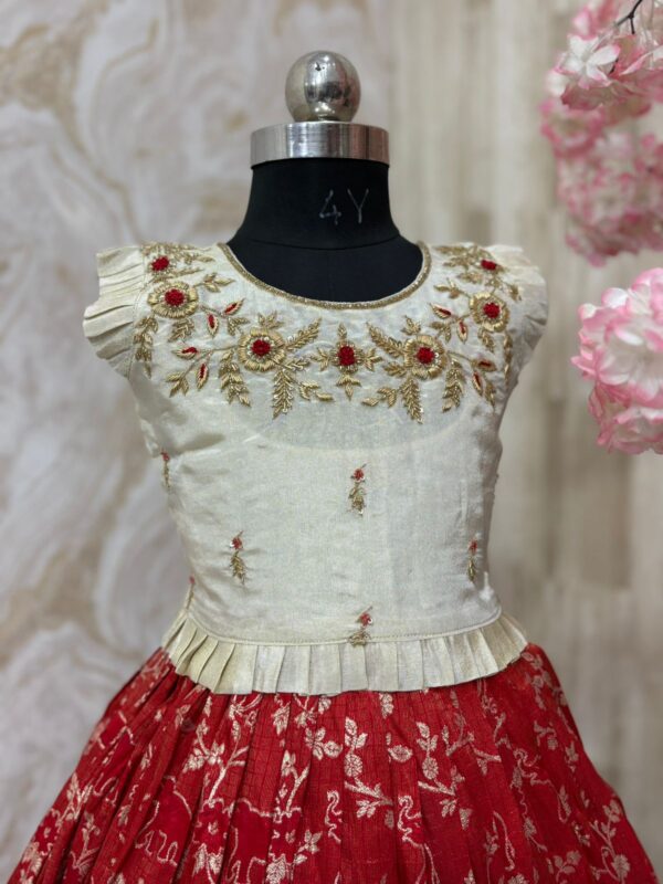 Soft tissue banaras lehenga paired with beautiful maggam work blouse