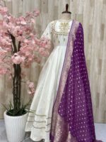 Rawsilk long gown with heavy maggam work on yoke part & tissue dupatta