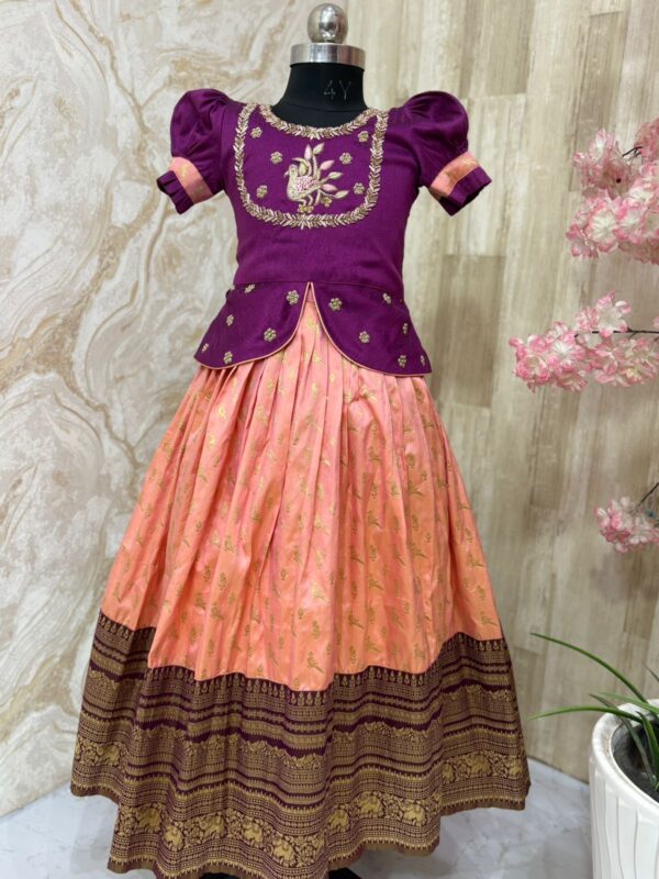 Soft pattu lehenga with rich kanchi border paired with beautiful maggam work blouse